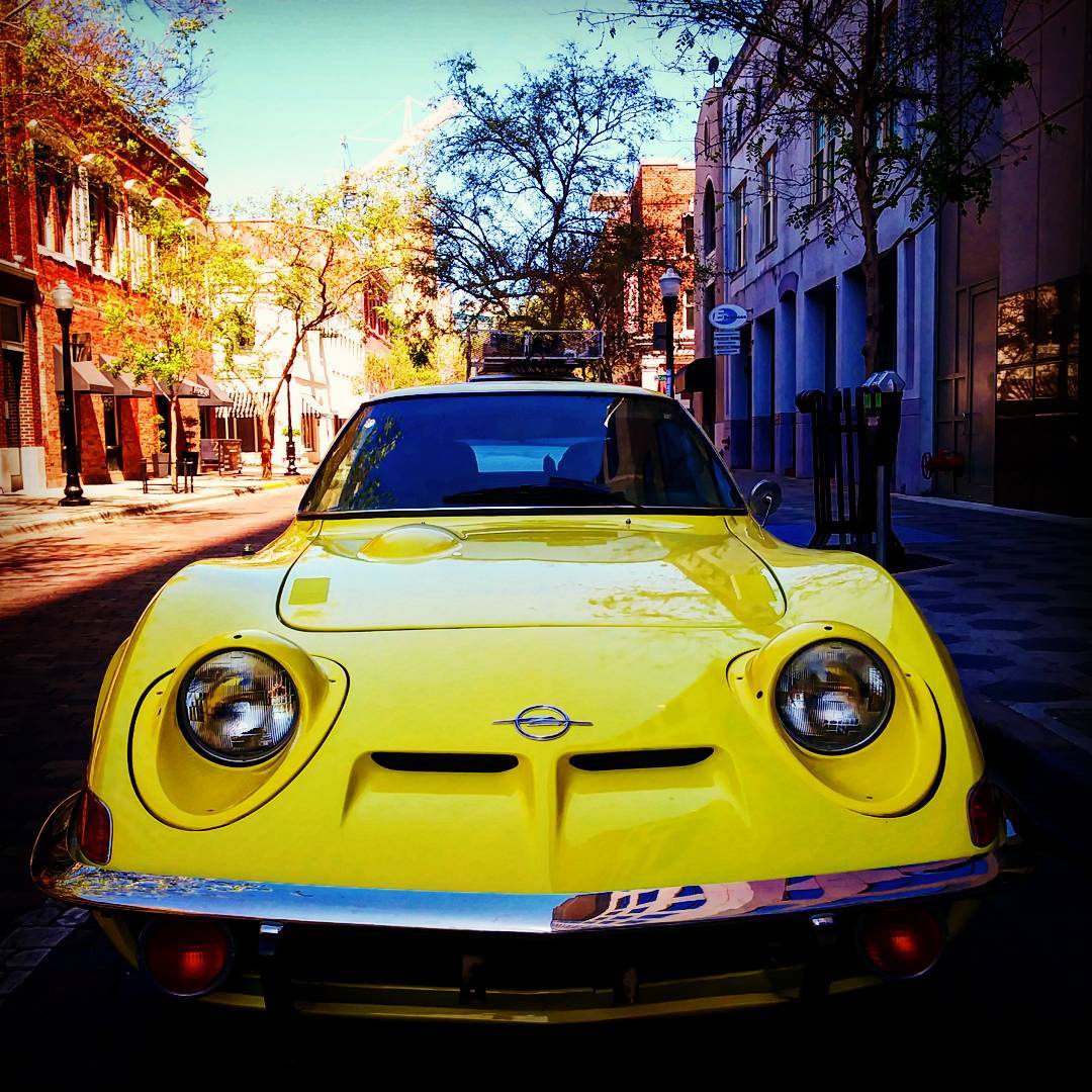 Yellow car street photograph
